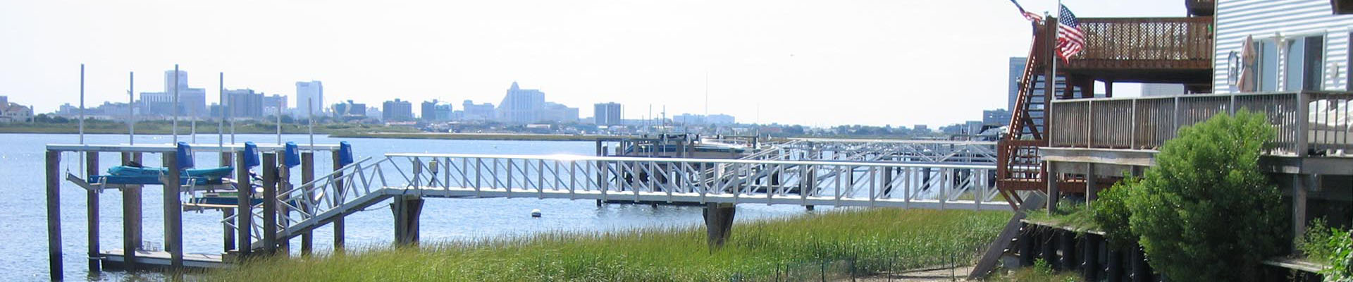 Gangway bridging from a waterfront home to a floating dock